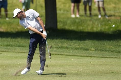 Hovland delivers clutch putts and wins Memorial in playoff